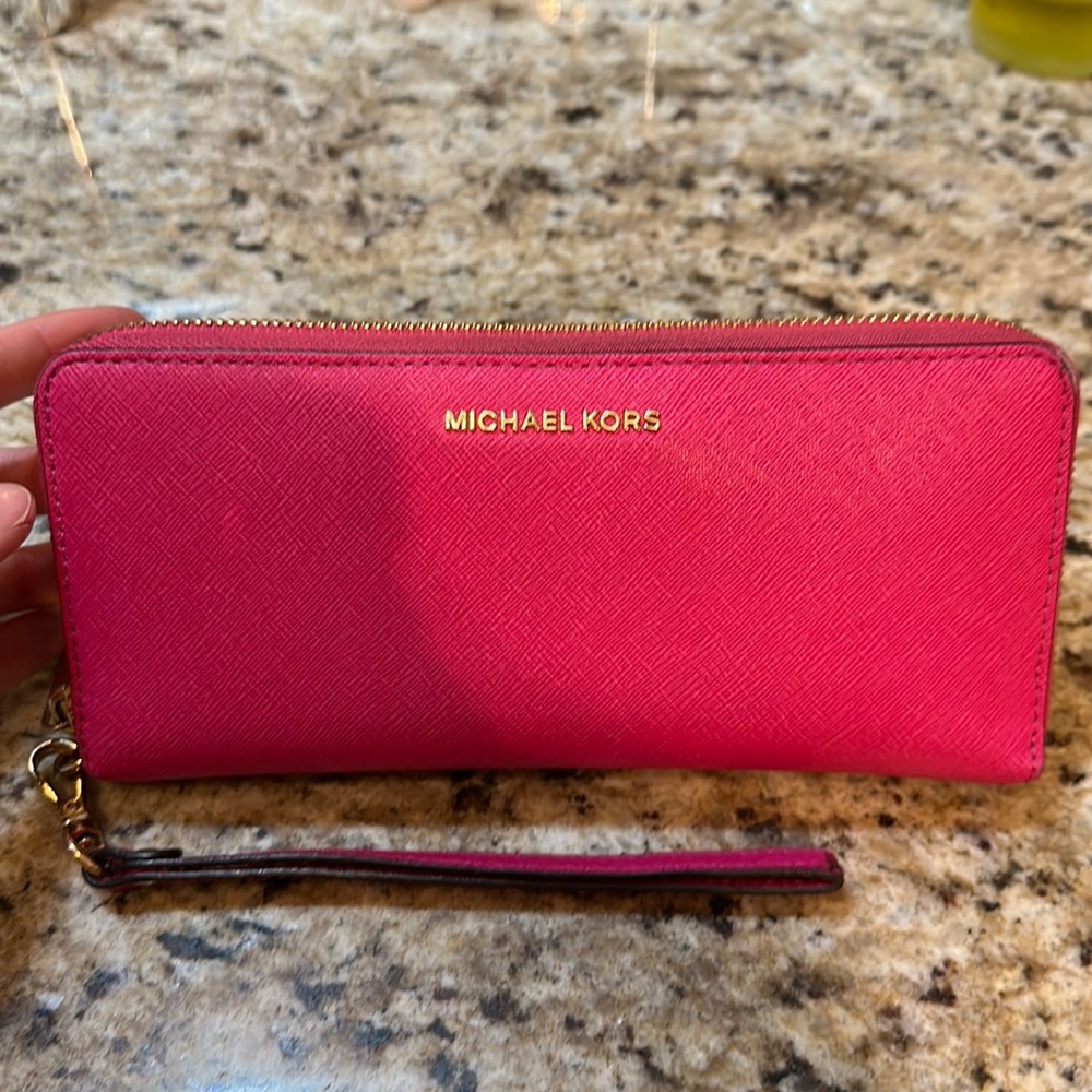 Hot Pink gently used Michael Kors zip wallet leather